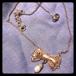 Bow charm necklace with pearl drop